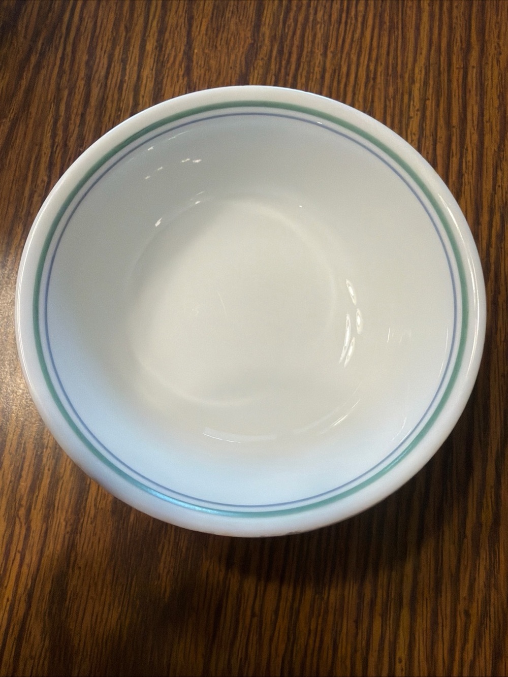 Corelle White Bowl with Green and Teal Rim Accents